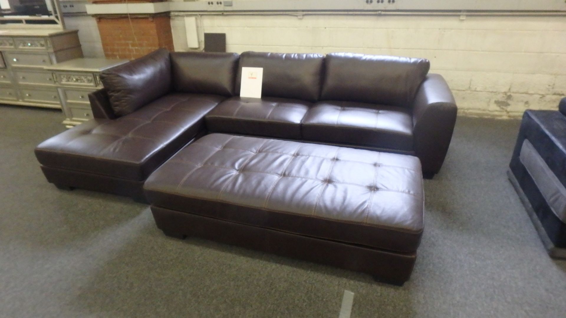 LOT - BROWN BONDED LEATHER SECTION W/ CHAISE W/ MATCHING OTTOMAN (LK-9380BRW) (FLOOR DISPLAY & (1)