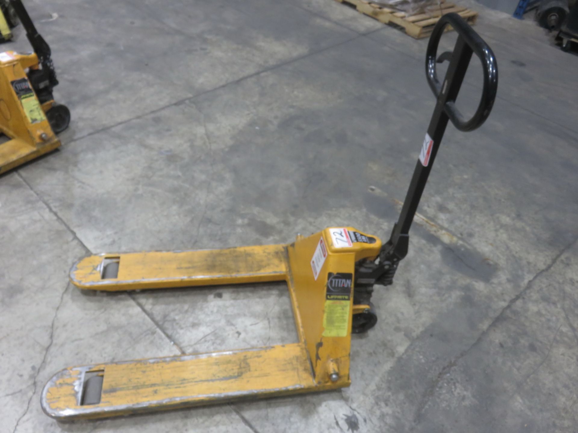 HYSTER 27" X 4' HYDRAULIC YELLOW PALLET TRUCK (AS IS)