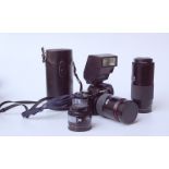 Minolta 700 und 3 ObjektiveSpiegelreflexkamera Minolta 7000 sowie 3 passende Objektive: Tokina