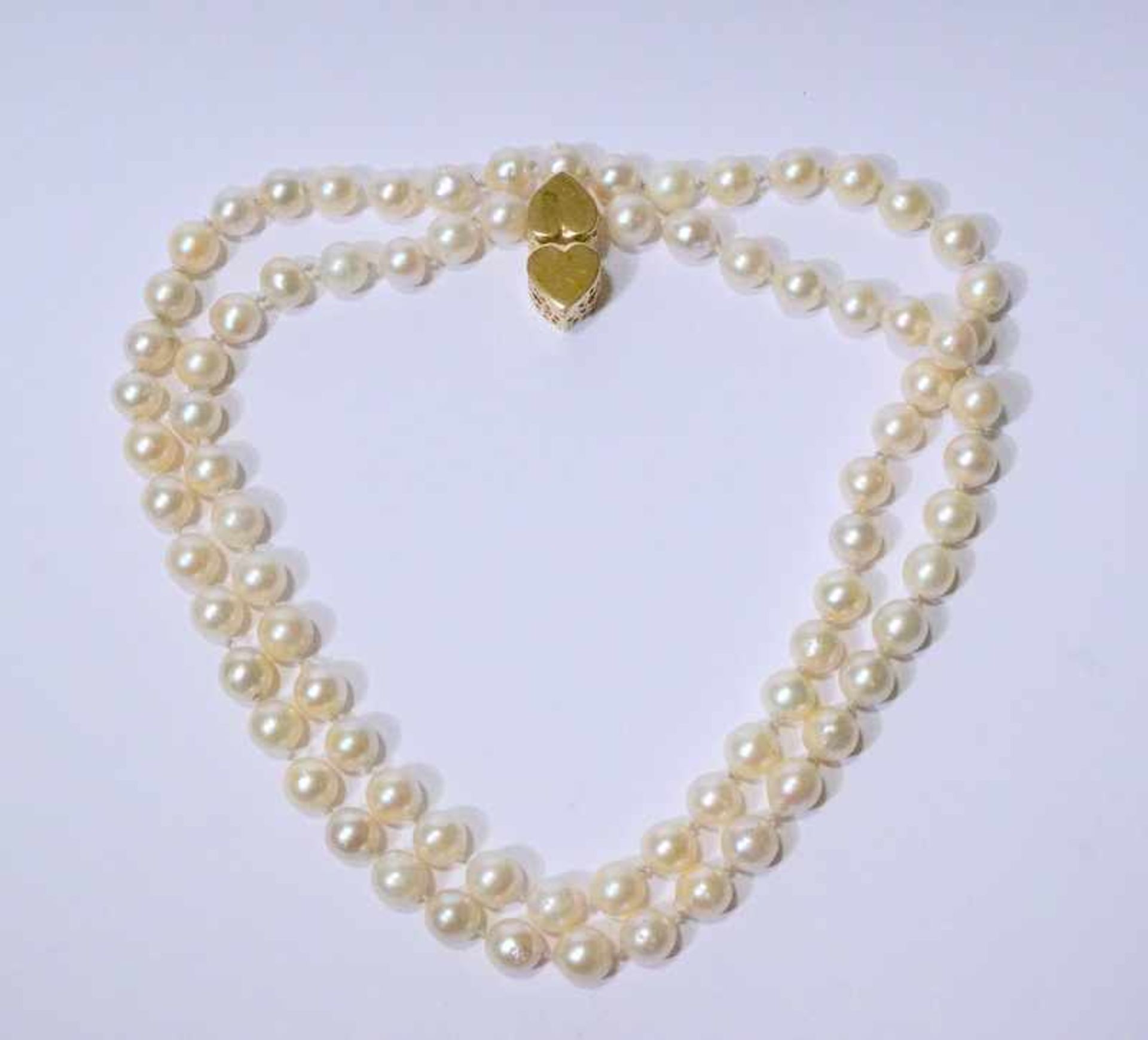 Südsseeperlenkette mit 80 Perlen à 1cm und 750er Schliessechampagnerfarben, von guter Qualität,