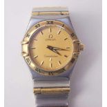 Omega, Uhrenmanufaktur (Biel/Schweiz): Damenuhr, ConstellationArmband aus Edelstahl, matt goldenes