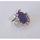 Großer Brilliant-Opalring, 585 WG, Gesamtkaratzahl ca. 1,64 ctLänge des ovalen Opals Doublette,