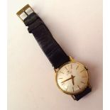 Tissot: Herrenuhr, 585 GGHandaufzug, Lederarmband mit Dornschließe, Gehäuse ungemarkt, 585 getestet,