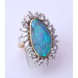 Boulder-Opal Ring, zus. ca. 2,5 ct Diamanten, Bicolor, 70er Jahre750 WG und GG, Besatz mit 8