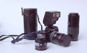 Minolta 700 und 3 ObjektiveSpiegelreflexkamera Minolta 7000 sowie 3 passende Objektive: Tokina