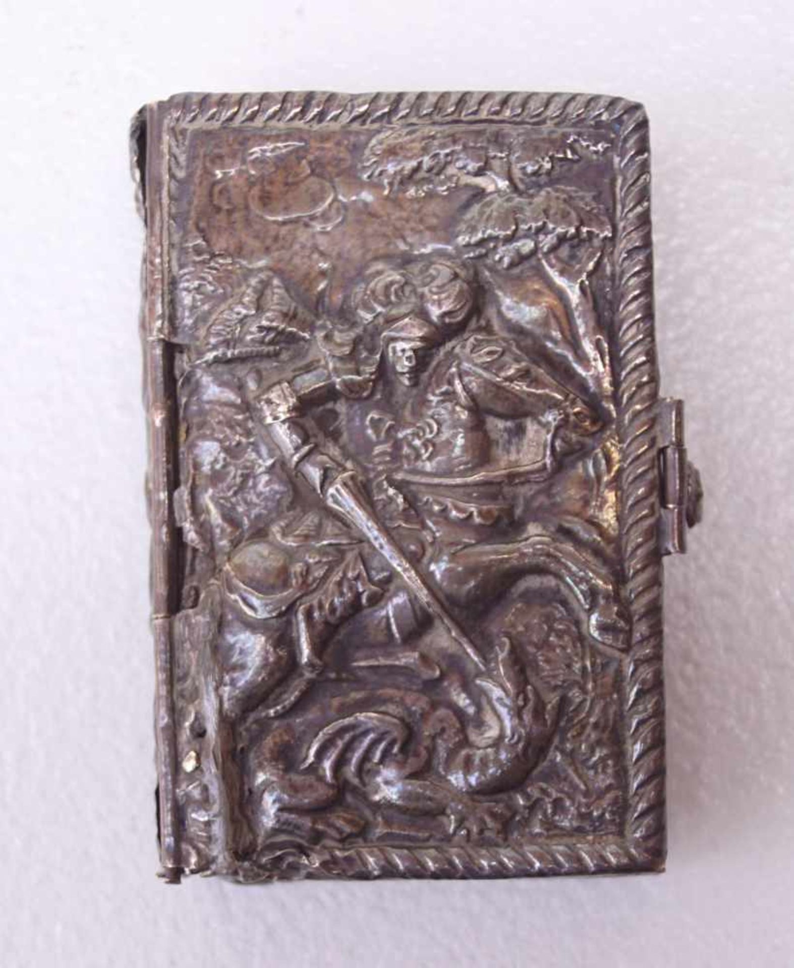 Miniaturbuch, Frankreich, dat. 1644Miniaturbuch mit einem Einband aus gedrücktem Silber, Darstellung
