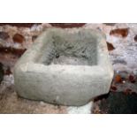 Small old stone trough