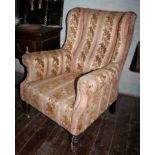 Victorian upholstered wing back armchair