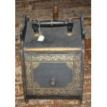 Aesthetic movement ebonised coal scuttle with golden geometric/floral decoration