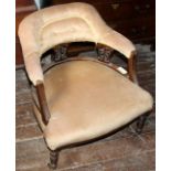 Edwardian upholstered nursing chair on turned legs