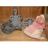 3 Victorian cast iron trivets and primitive doll in paisley shawl