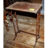Small antique hardwood occasional table, being the larger of a nest of 3