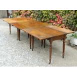 Unique metamorphic dining table in mahogany from the first quarter of the 19th century. Comprising