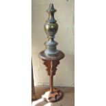 Metal lamp base on wooden pedestal