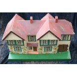 1940s dolls house by Triang (Lines Brothers) with opening rear, along with door and windows - some