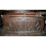 C1700 4 panel oak coffer with arcade top rail, original lock and diamond motifs
