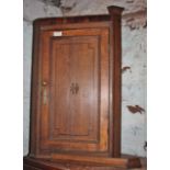 Antique oak corner cupboard with ebony stringing and inlay to door