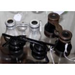 Two pairs of opera glasses, one with mother of pearl casing plus another optical instrument