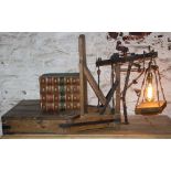 Antique French cheese scales converted to be a library or reading lamp and book stand.