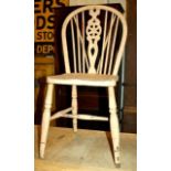 Single antique, painted, wheelback kitchen chair