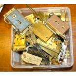 Quantity and brass cabinet and other antique locks with keys.