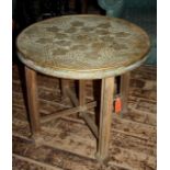 1920s 'grand tour' Benares brass circular table with four legged folding wooden stand
