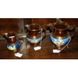 Three Victorian lustre ware jugs