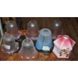 Seven antique glass lamp shades (on bottom shelf of lot 327)