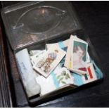 Quantity of 1930's cigarette cards in old tin
