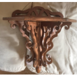 Fret decorated wall bracket