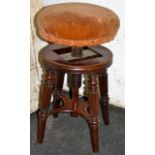 William IV mahogany piano stool with turned and fluted legs: fully adjustable by way of wooden screw