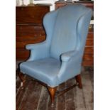 Wing back arm chair with walnut cabriole legs and stretchers