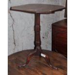 Circa 1820 octagonal mahogany wine table on turned pedestal with 3 cabriole legs