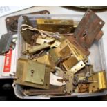 Quantity of brass cabinet and other locks with their keys