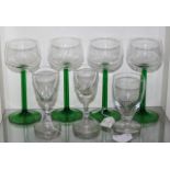 Three old drinking glasses and a set of 4 wine glasses with green stems (in Lot 295)
