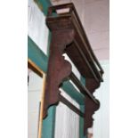 Pair of hanging oak racks with galleried tops