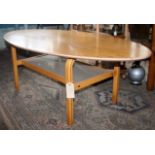 Oval Scandinavian style coffee table with glass under tier