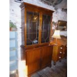 Edwardian glazed mahogany bookcase with cupboard under