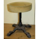 Victorian cast iron pedestal stool with claw feet and upholstered seat
