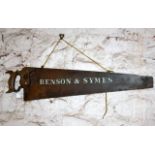Large antique saw advertising the joinery business of Benson & Symes