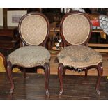 Pair of mid-Victorian salon chairs of elegant proportions with cabriole legs