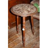 Gypsy table with carved foliate circular top and three turned legs