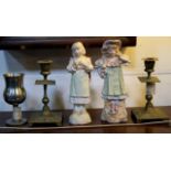 Pair of porcelain female figures, pair of small brass candle sticks and plated chalice