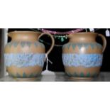 Pair of Doulton Stoneware jugs in Portland and blue glaze