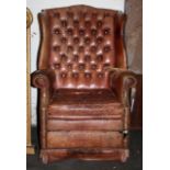 Wing back buttoned leather chair
