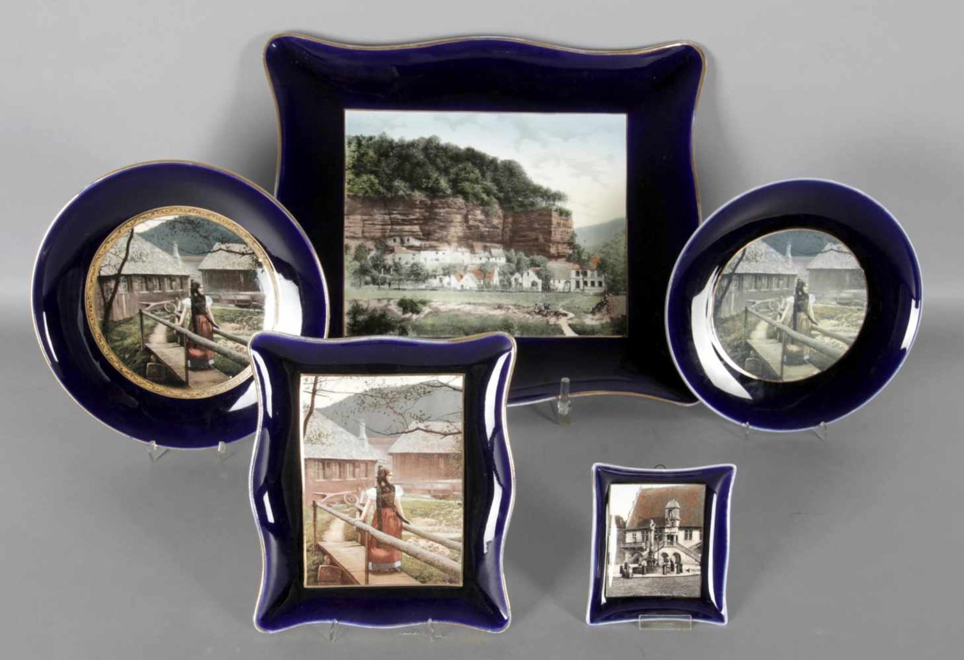 Fünf verschiedene Keramikteller bzw. Platten, Sarreguemines, Ende 19. Jh.Motive nach Photoglob & Co.