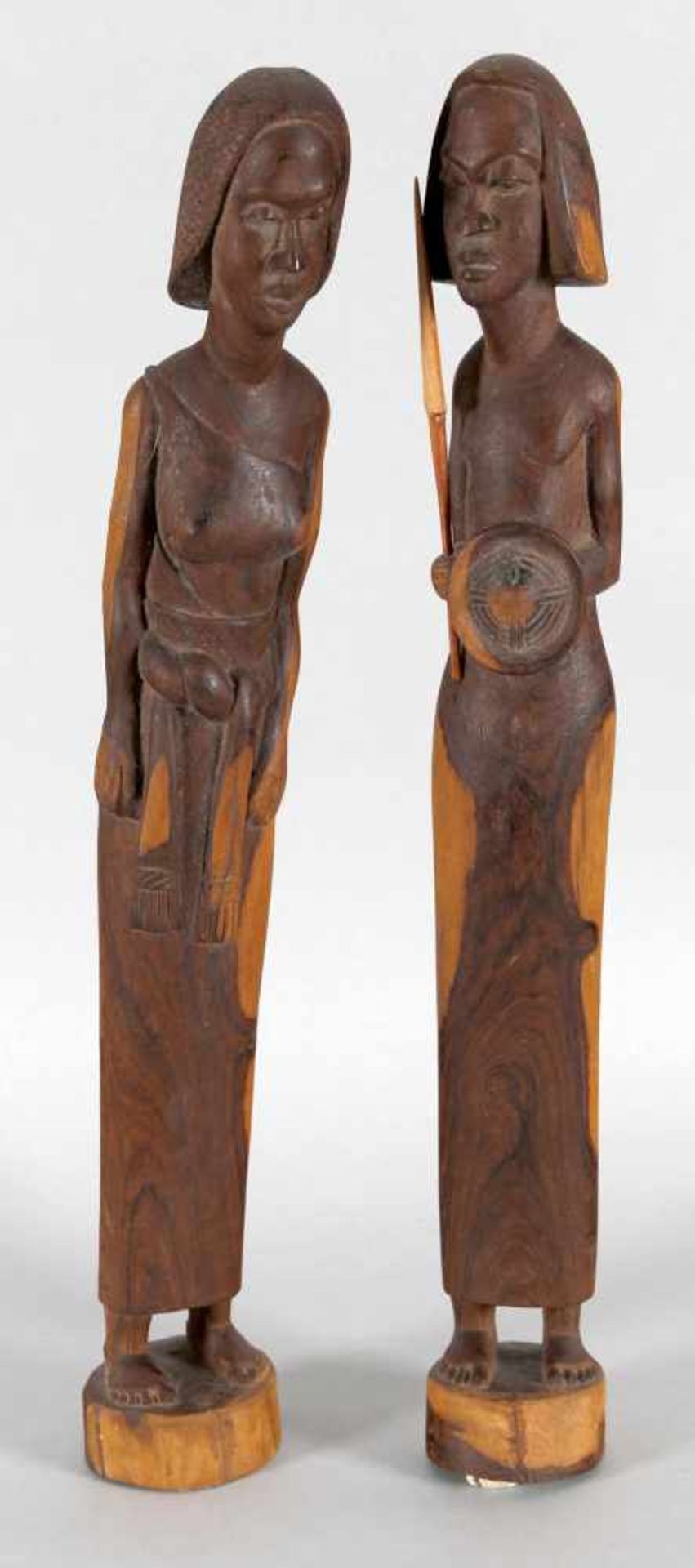 Figurenpaar Mann und Frau aus exotischem zweifarbigem Holz, Afrika, wohl 2. H. 20. Jh.der Mann mit