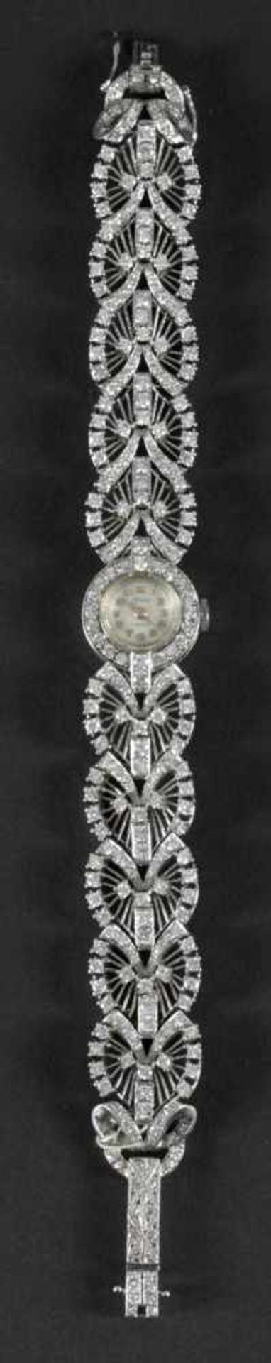 Damen-Armbanduhr "Onsa", 750er WG, besetzt mit 272 Diamanten (Brillant, Sechzehnkant) von zus. 9,4