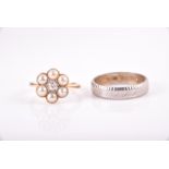 An 18ct yellow gold, diamond, and pearl floral cluster ring size F 1/2, 2.7 grams, together with a