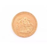 A George III gold sovereign  laur. head facing right, reverse St. George and the dragon, milled
